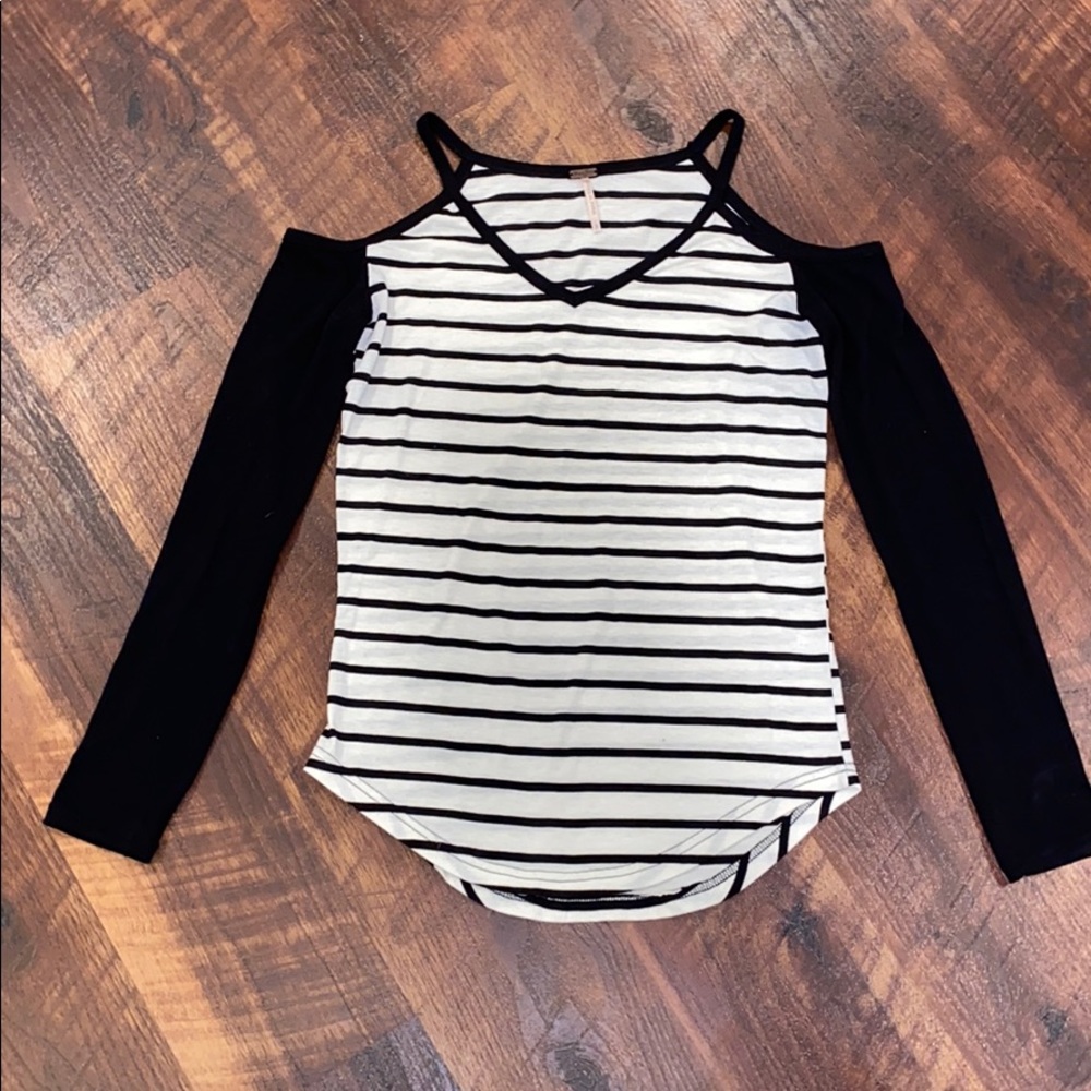 Off the shoulder but strapped shirt